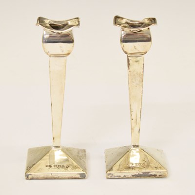 Lot 204 - Pair of Edward VII silver table candlesticks