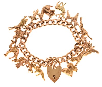 Lot 52 - 9ct gold curb-link charm bracelet