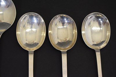 Lot 195 - Three trefid spoons and two silver serving spoons