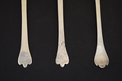 Lot 195 - Three trefid spoons and two silver serving spoons