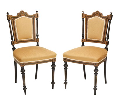 Lot 702 - Pair of mid Victorian ebonised salon chairs