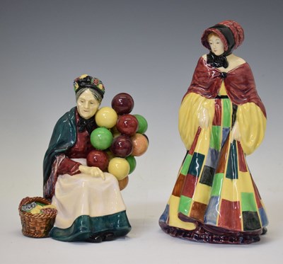 Lot 494 - Royal Doulton  - 'Old Balloon Seller' together with 'Parsons Daughter'