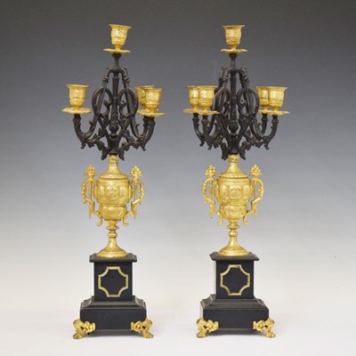 Lot 338 - Pair of four-branch (five-light) gilt metal candelabra