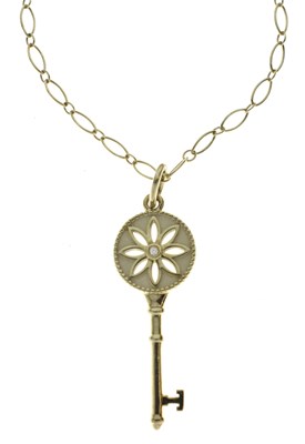 Lot 48 - Tiffany & Co. - Silver 'Daisy' key pendant necklace