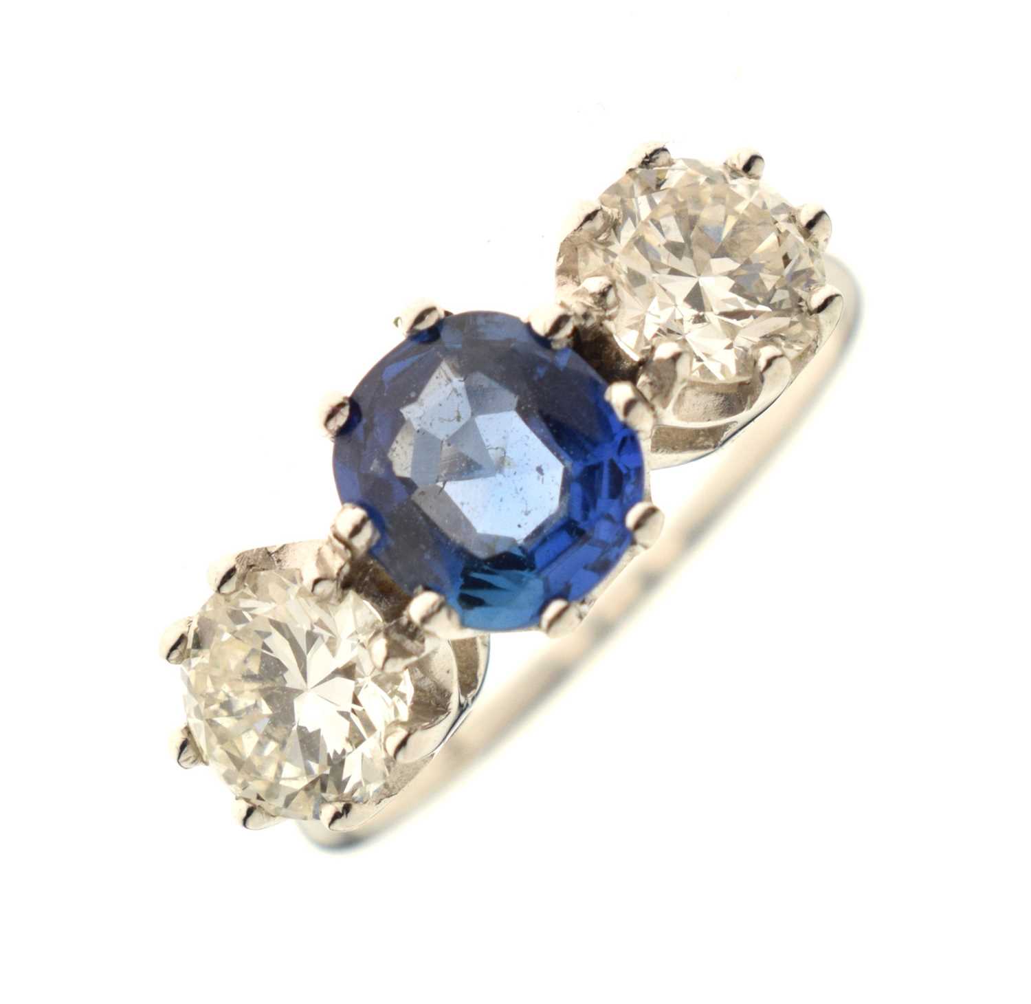 Lot 12 - Sapphire and diamond 18ct white gold three-stone ring