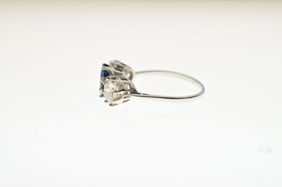 Lot 12 - Sapphire and diamond 18ct white gold three-stone ring