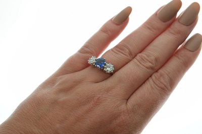 Lot 12 - Sapphire and diamond 18ct white gold three-stone ring