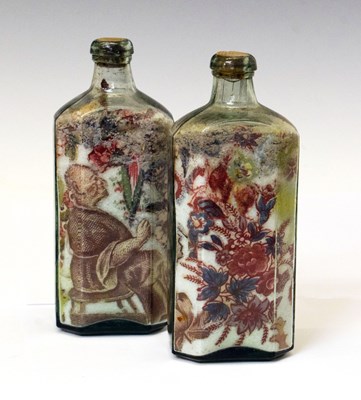 Lot 254 - Unusual pair of late Georgian salt and chintz-filled glass bottles