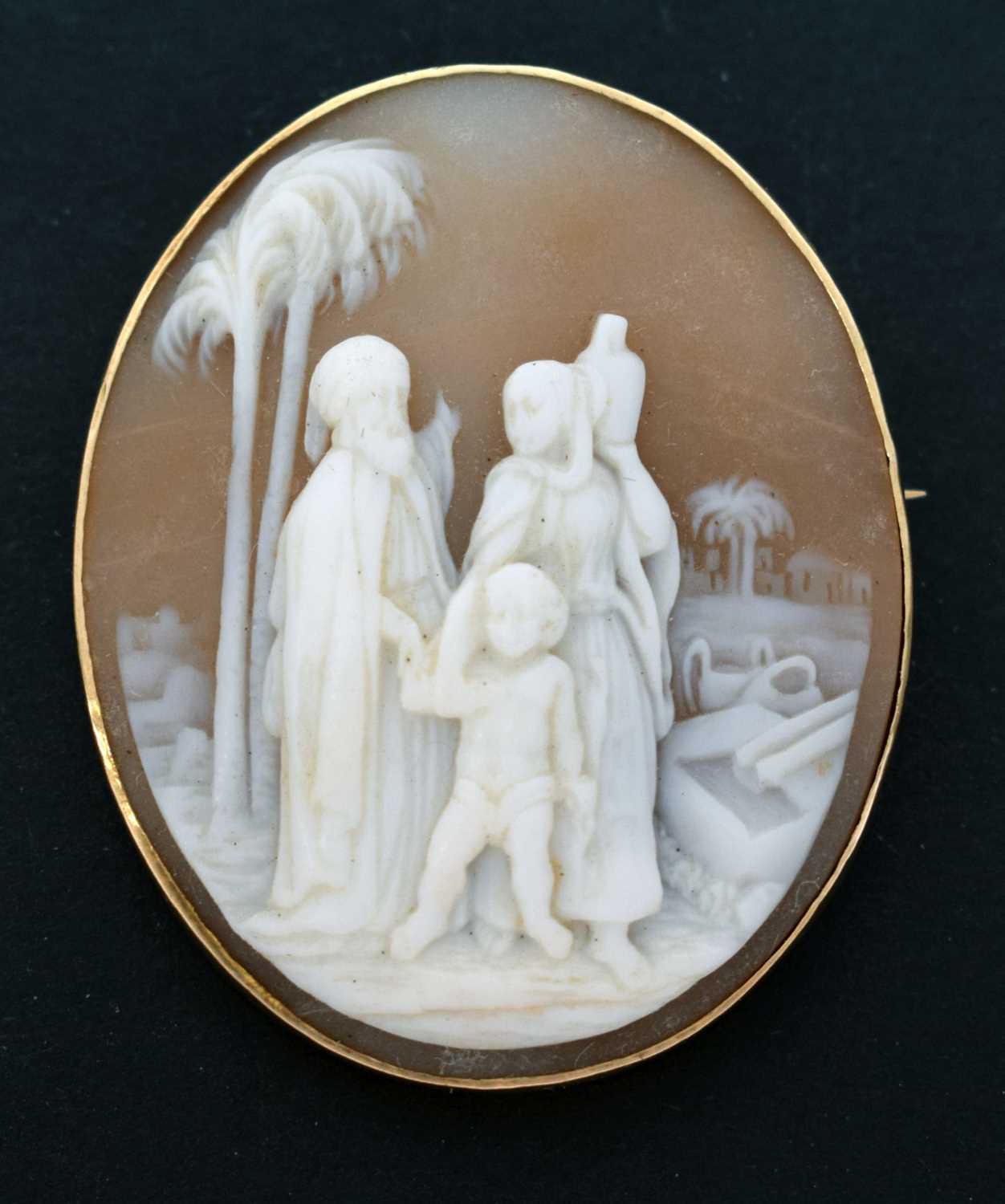 Lot 55 - Shell cameo brooch, depicting Middle Eastern figures in a landscape