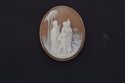 Lot 55 - Shell cameo brooch, depicting Middle Eastern figures in a landscape