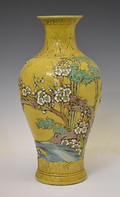 Lot 524 - Large Chinese relief-moulded sancai-glazed baluster vase