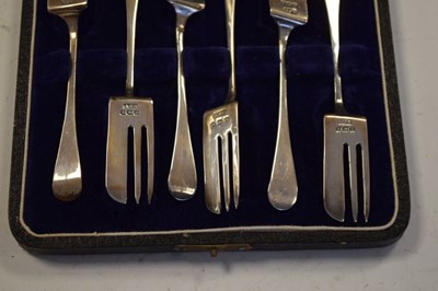 Lot 181 - Cased set of six George V silver cake forks
