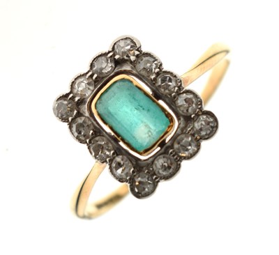 Lot 18 - Emerald and diamond 18ct yellow gold cluster ring