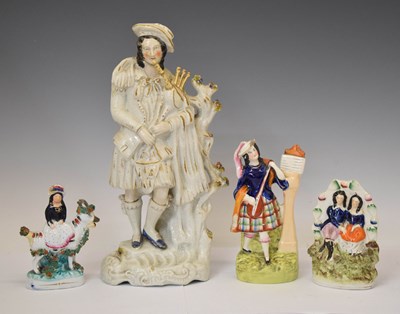 Lot 476 - Four Staffordshire figures