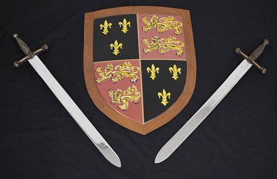 Lot 392 - Reproduction Medieval-style shield and two swords