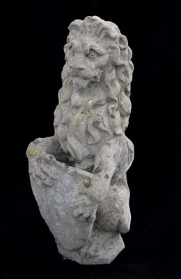 Lot 525 - Weathered composition lion garden ornament