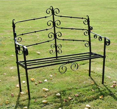 Lot 514 - Black painted wrought iron garden bench