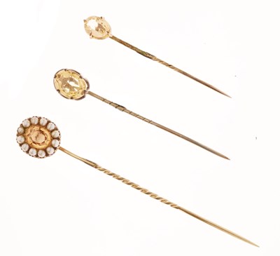 Lot 121 - Imperial topaz and pearl stick pin