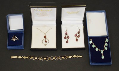 Lot 101 - Small group of silver and white metal hardstone set jewellery