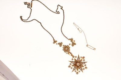 Lot 35 - Edwardian diamond and pearl unmarked yellow gold pendant necklace