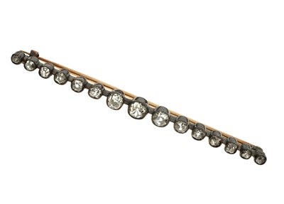 Lot 26 - Late 19th / early 20th century diamond, yellow and white metal bar brooch