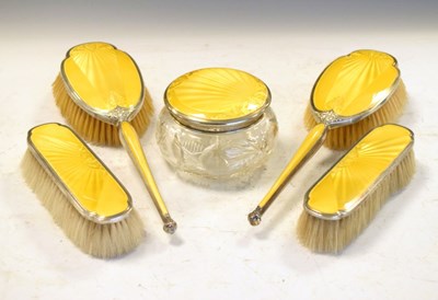 Lot 152 - Five-piece yellow enamel and silver dressing table set
