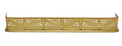 Lot 733 - Art Nouveau-style brass fender