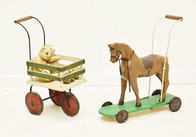 Lot 478 - Three vintage teddy bears, push along horse, tricycle cart