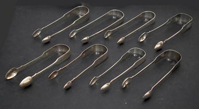 Lot 239 - Eight pairs of George III to William IV silver sugar tongs, various Exeter sponsors