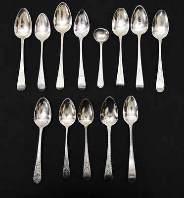 Lot 246 - Twelve George III silver spoons with bright-cut decoration