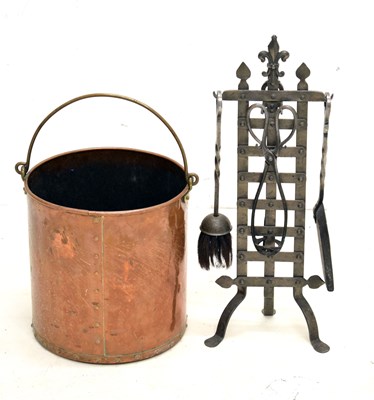 Lot 348 - Arts & Crafts-style wrought iron companion set