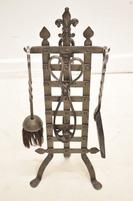 Lot 348 - Arts & Crafts-style wrought iron companion set