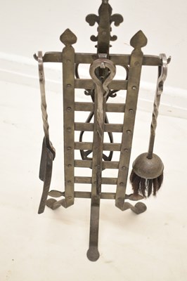 Lot 348 - Arts & Crafts-style wrought iron companion set