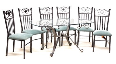 Lot 635 - Modern wrought metal and glass top seven-piece dining suite