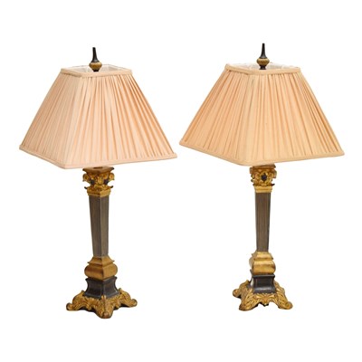 Lot 335 - Pair of modern Corinthian-style black and gold table lamps