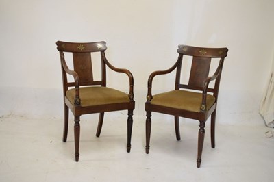 Lot 582 - Pair of 19th Century Biedermeier brass-inlaid mahogany elbow chairs