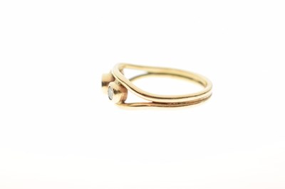 Lot 17 - Modern 9ct gold three-stone diamond ring