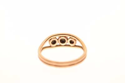 Lot 17 - Modern 9ct gold three-stone diamond ring