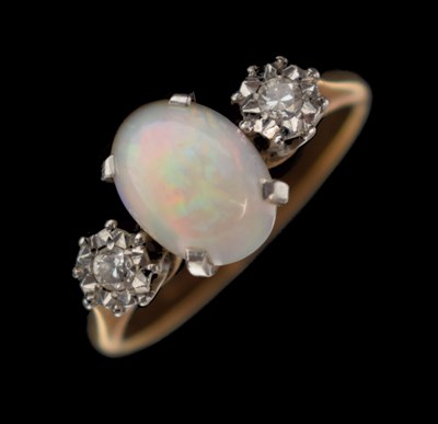 Lot 25 - Opal and diamond three-stone ring