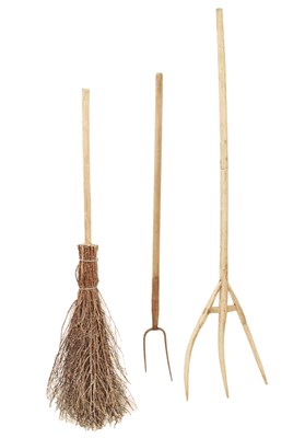 Lot 768 - Garden besom, wooden hay rake and a pitchfork