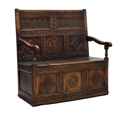 Lot 470 - Carved oak settle, concocted from 17th and 18th century timbers