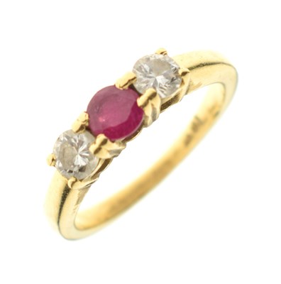 Lot 27 - Ruby and diamond three-stone ring