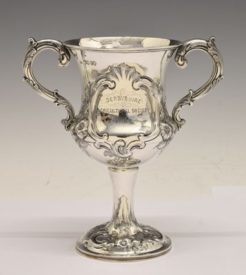 Lot Victorian silver trophy cup with twin-scroll handles