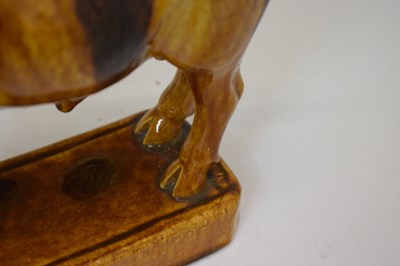 Lot 524 - Portuguese treacle glazed pottery novelty decanter by M Mafra