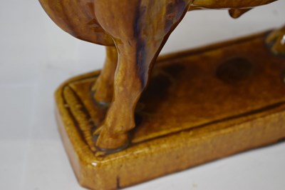 Lot 524 - Portuguese treacle glazed pottery novelty decanter by M Mafra