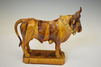 Lot 524 - Portuguese treacle glazed pottery novelty decanter by M Mafra