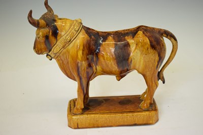Lot 524 - Portuguese treacle glazed pottery novelty decanter by M Mafra