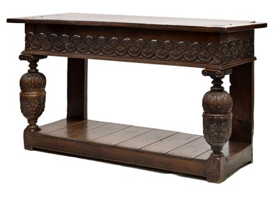 Lot 469 - Substantial 'Jacobethan' carved joined oak buffet or serving table