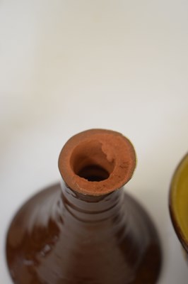 Lot 538 - Studio Pottery - Set of eight slip decorated terracotta goblets by Wetheriggs Pottery
