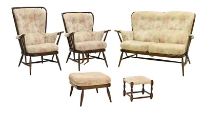 Lot 687 - Ercol - Three piece lounge suite and two footstools